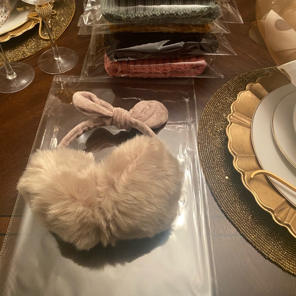 New in Packaging. Women’s Taupe Faux Fur Earmuffs with a Bow. One size fits all